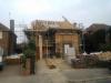 front partially extended with additiona front gable and attic trusses installed by DKM Consultants