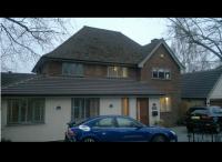 single storey wrap around extension and loft conversion with detached double garage by DKM Consultants